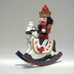 Vánoční dřevěná dekorace louskáček na houpacím koni